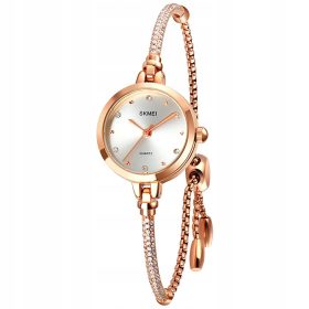   enska ura SKMEI, elegantna srebrna zapestnica s pozlačenimi detajli