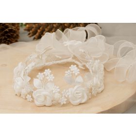 Beli venček za hostije za slovenski trg