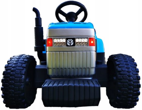 ELEKTRIČNI TRAKTOR ZNAMKE NEW HOLLAND S PRIKOLICO IN AKUMULATORJEM NA DALJINSKO UPRAVLJANJE