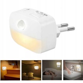   Bela nočna lučka z LED in senzorjem gibanja - Kompaktna in energijsko učinkovita nočna svetilka za varnost in udobje v temi