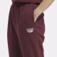 Reebok ženske trenirke v bordo barvi, velikost S